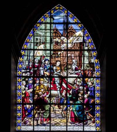 Why do churches have stained glass windows?