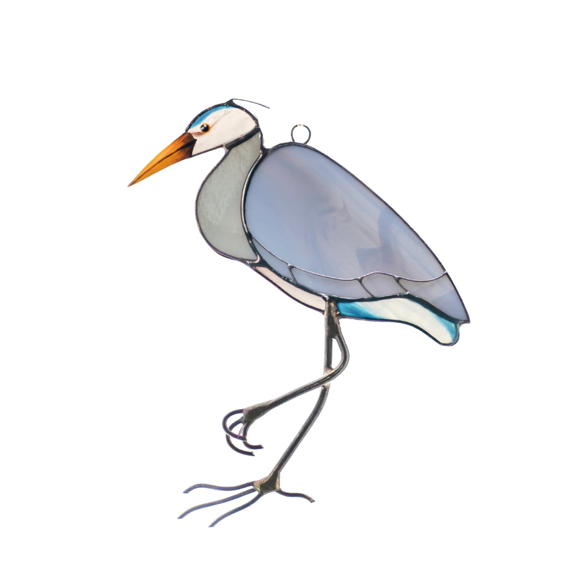 Great Blue Heron stained glass suncatcher on a white background - handmade bird of blue opalescent glass with a soft grey neck, orange beak and slender soldered wire legs