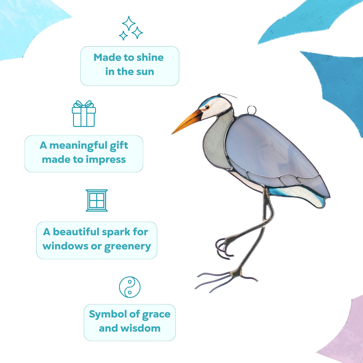 Blue heron stained glass suncatcher made to shine in the sun - a symbol of grace and wisdom, a meaningful handmade gift and a beautiful spark of colour for windows or greenery