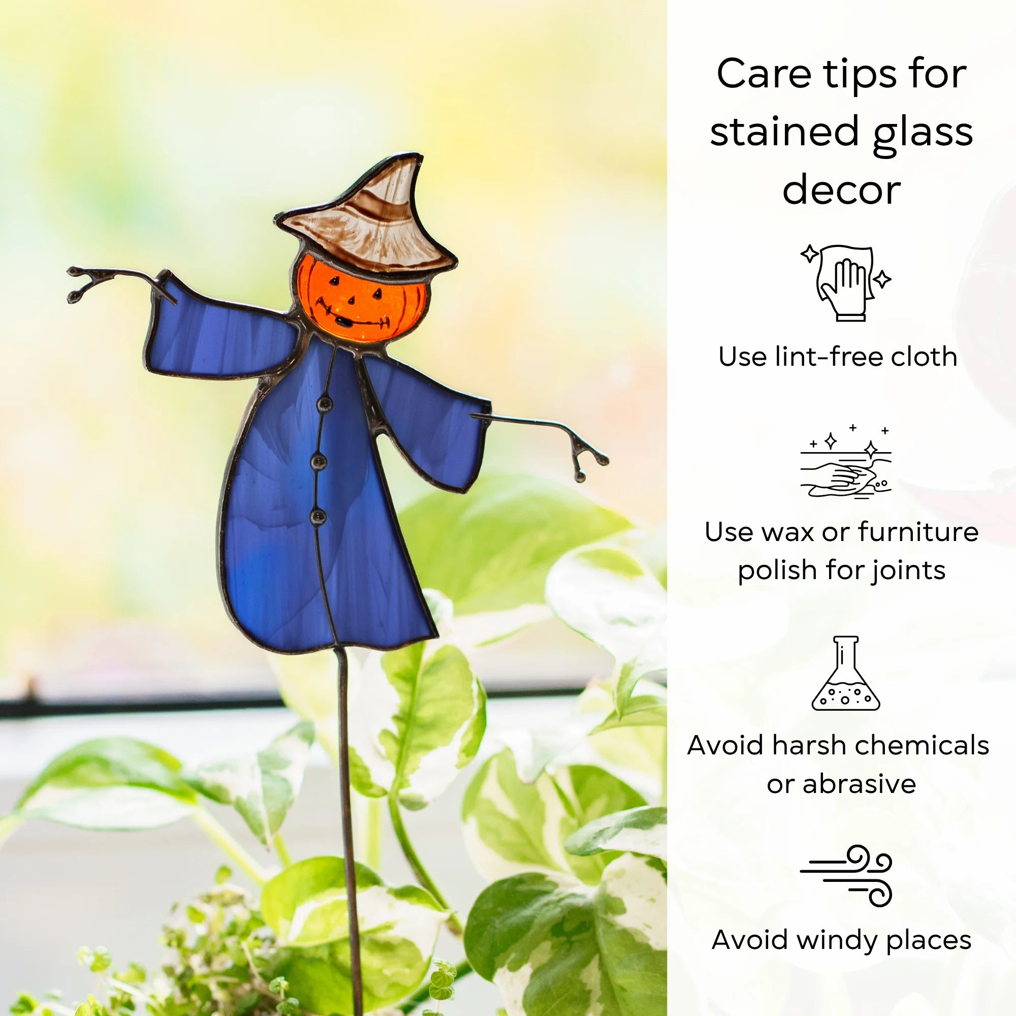 Care tips for stained glass decor beside a pumpkin-headed scarecrow plant stake - wipe with a lint-free cloth, wax the joints, avoid harsh chemicals and windy places
