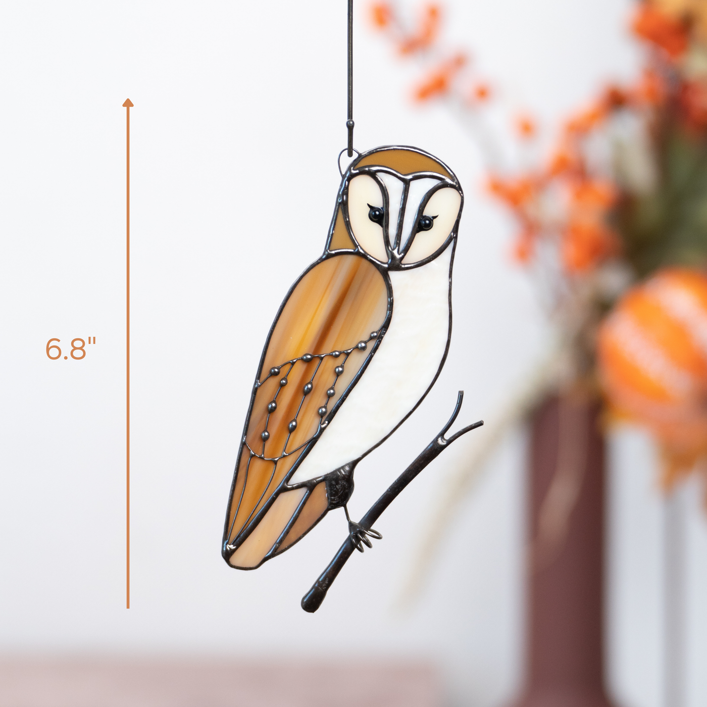 Beige and cream-colored stained glass owl with 6.8-inch height indicated