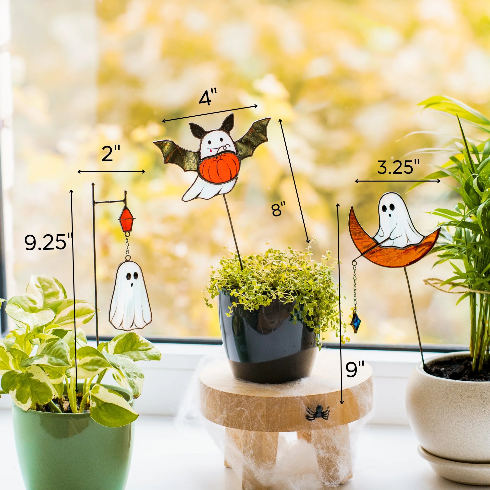 This dimensions infographic details the Halloween stained glass plant stakes, showcasing them as a wonderful and memorable gift.