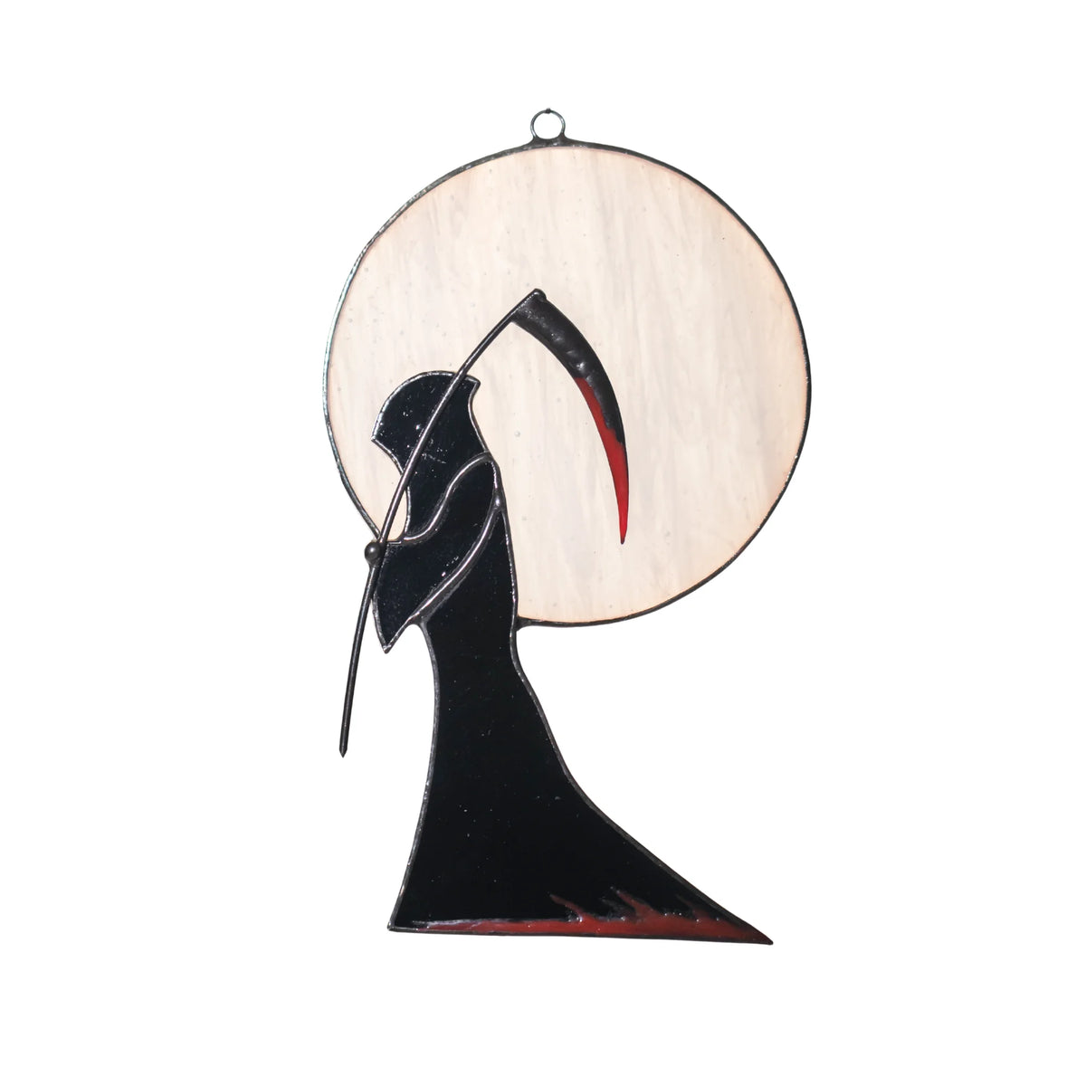 Handmade Halloween stained glass window hanging of a hooded Grim Reaper with a scythe standing against a pale opal full moon - gothic window decor on a hanging ring