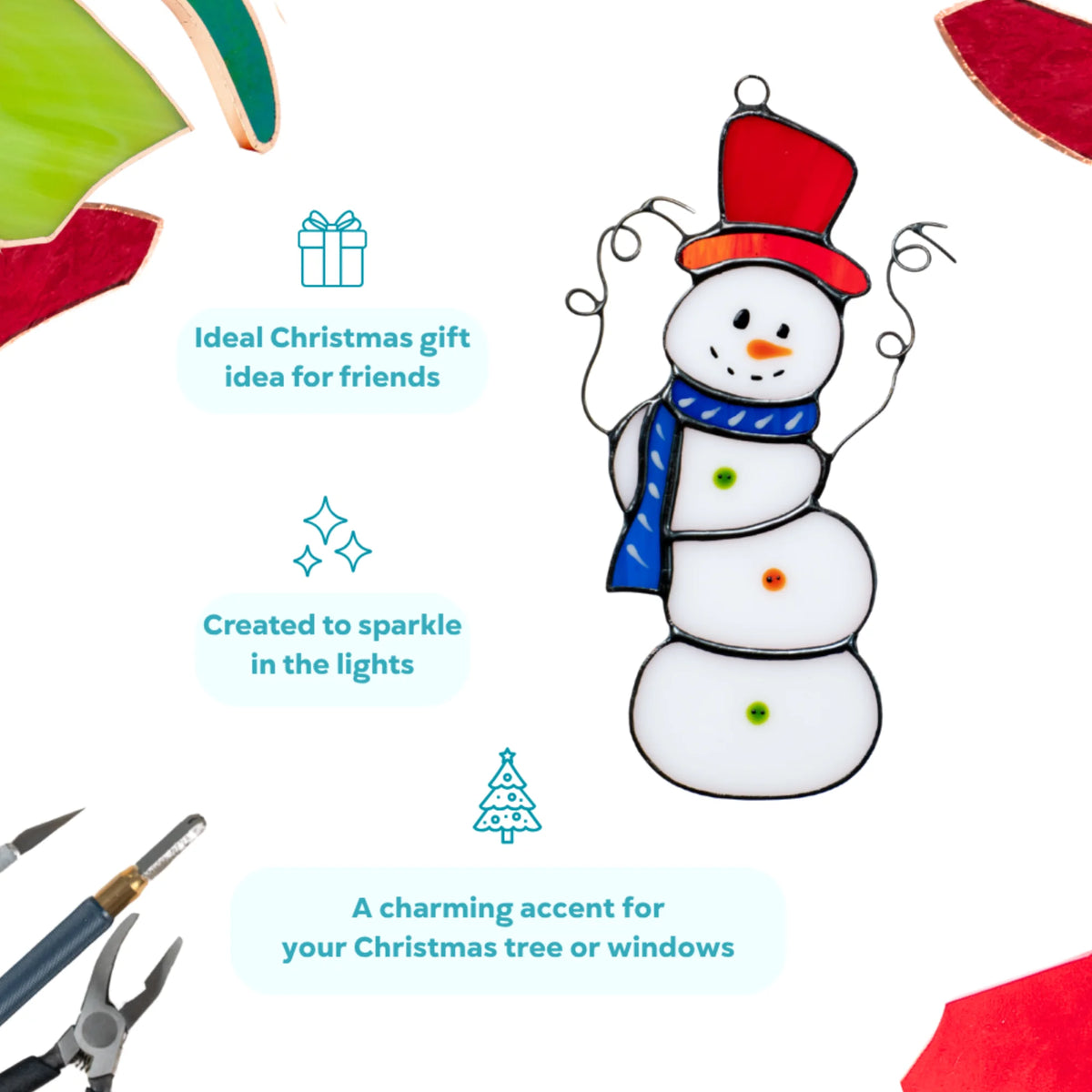 Christmas stained glass snowman suncatcher in a red top hat and blue scarf, created to sparkle in the lights - a charming accent for your Christmas tree or windows and an ideal Christmas gift for friends
