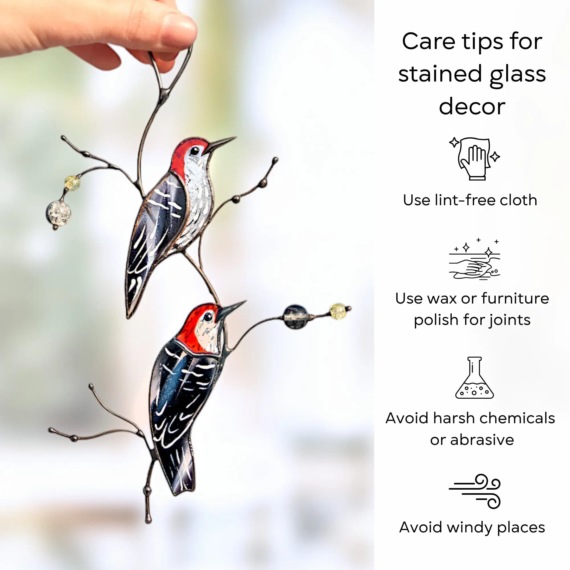 An infographic featuring woodpecker pair in suncatcher with tips: using a lint-free cloth, wax/furniture polish for joints, avoiding harsh chemicals, and avoiding windy places.