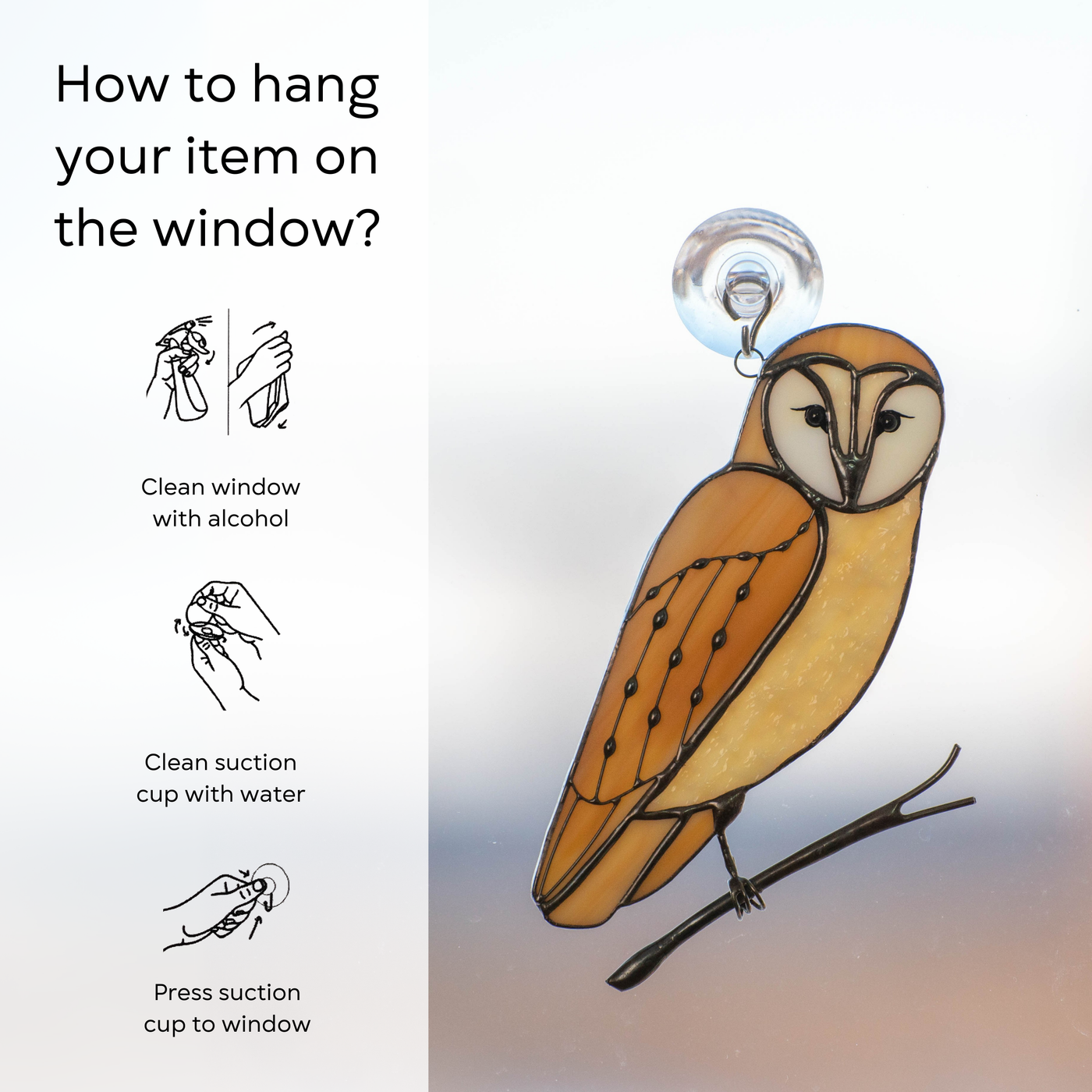 Owl stained glass suncatcher shown hanging on window glass with included suction cup