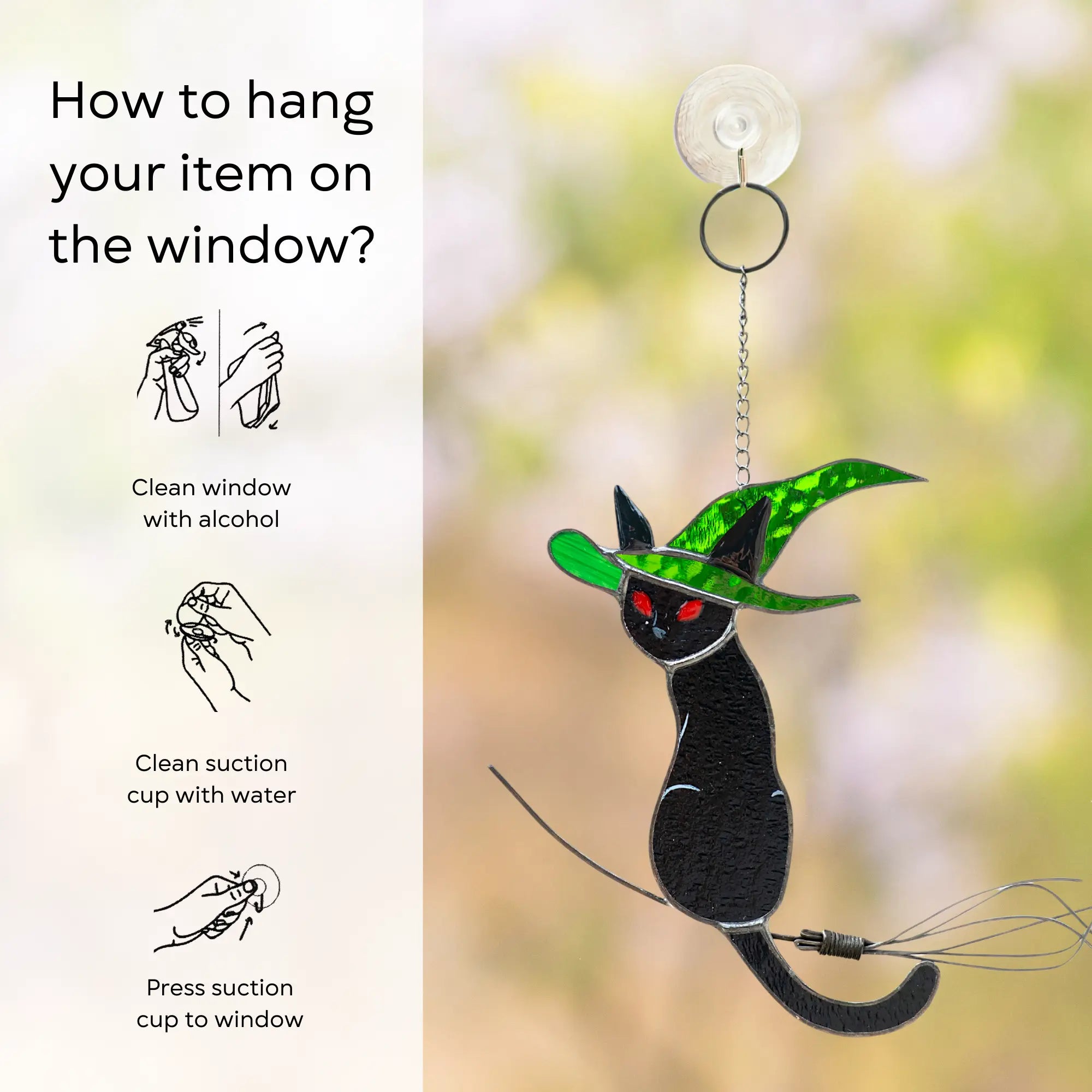 Stained glass Black cat with green hat and red eyes suncatcher hanging on a window with instructions: clean window and suction cup, press a cup to the surface