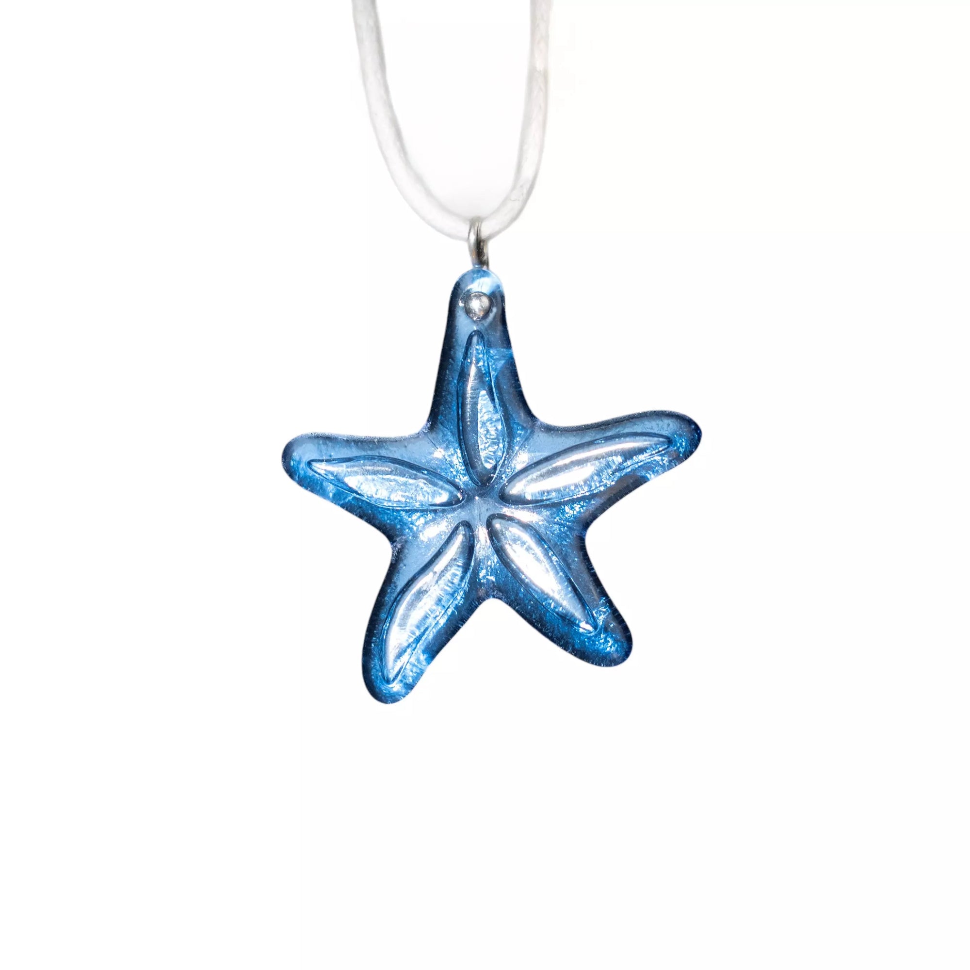 Sapphire-toned fused stained glass starfish pendant on a white cord