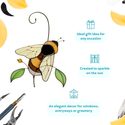 Glass bumble bee suncatcher with honey-toned wings and two green glass leaves s a perfect gift for any occasion.