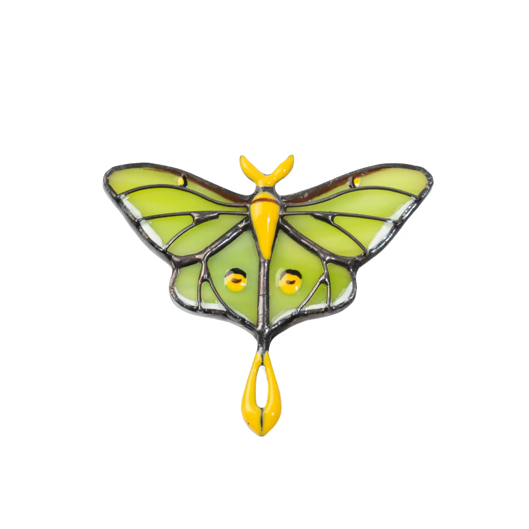 Butterfly staned glass brooch with green wings and yellow body on a white background