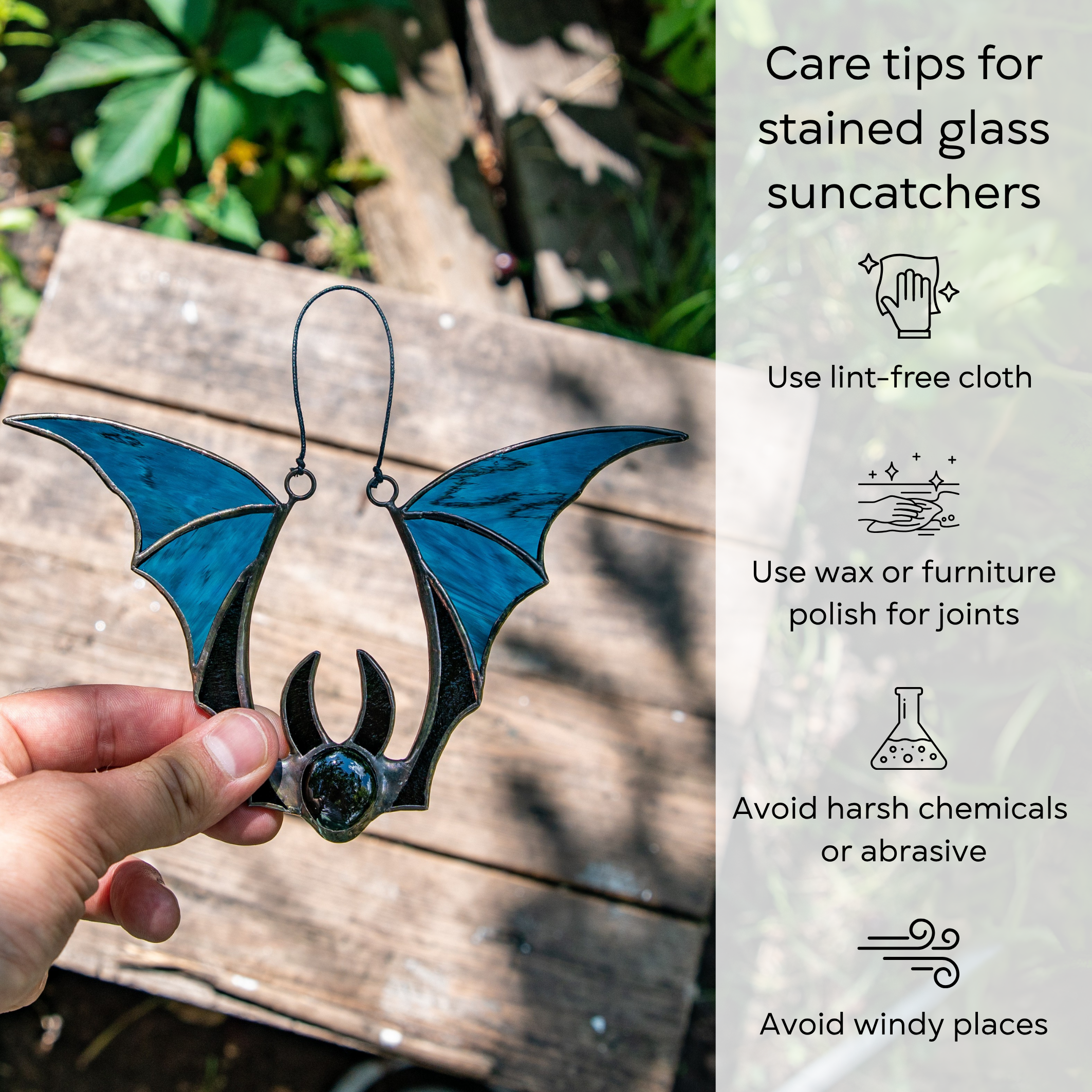 Care instruction infographic for blue stained glass bat shown outdoors in hand: use lint-free cloth, polish joints with car wax or furniture polish, avoid harsh chemicals, and windy places.
