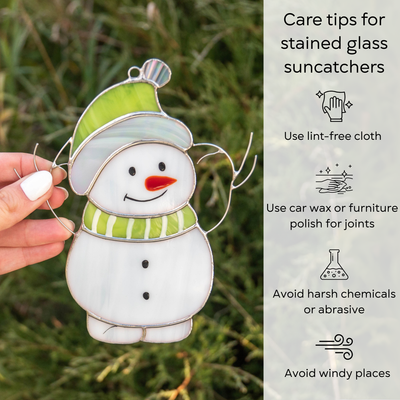 Photo of snowman suncatcher with care tips listed on the right: use lint-free cloth, polish joints with car wax or furniture polish, avoid harsh chemicals, and windy places.