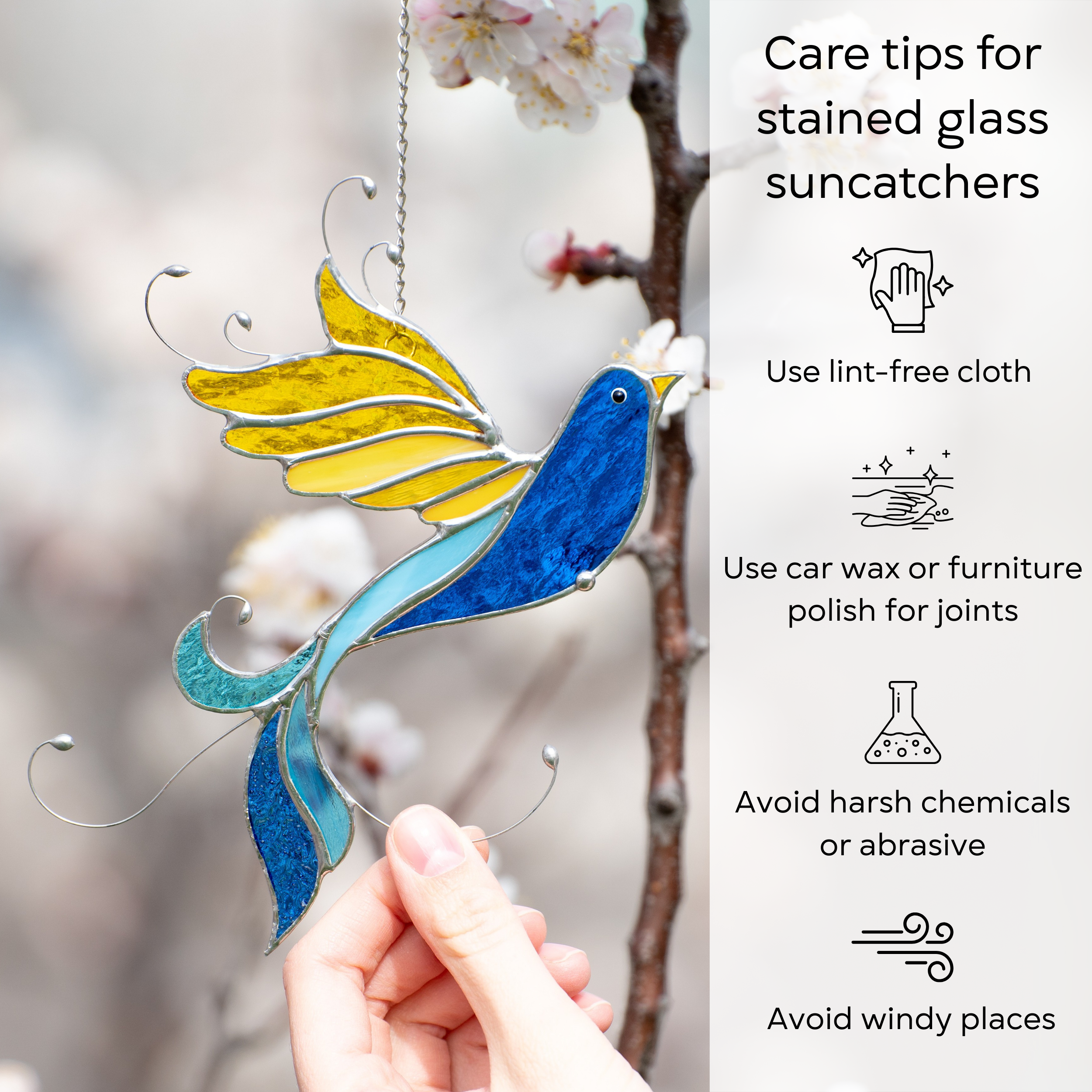 Infographic showing a stained glass bird in blue and yellow near blossoms, with care tips: use lint-free cloth, polish joints, avoid harsh chemicals, avoid wind.