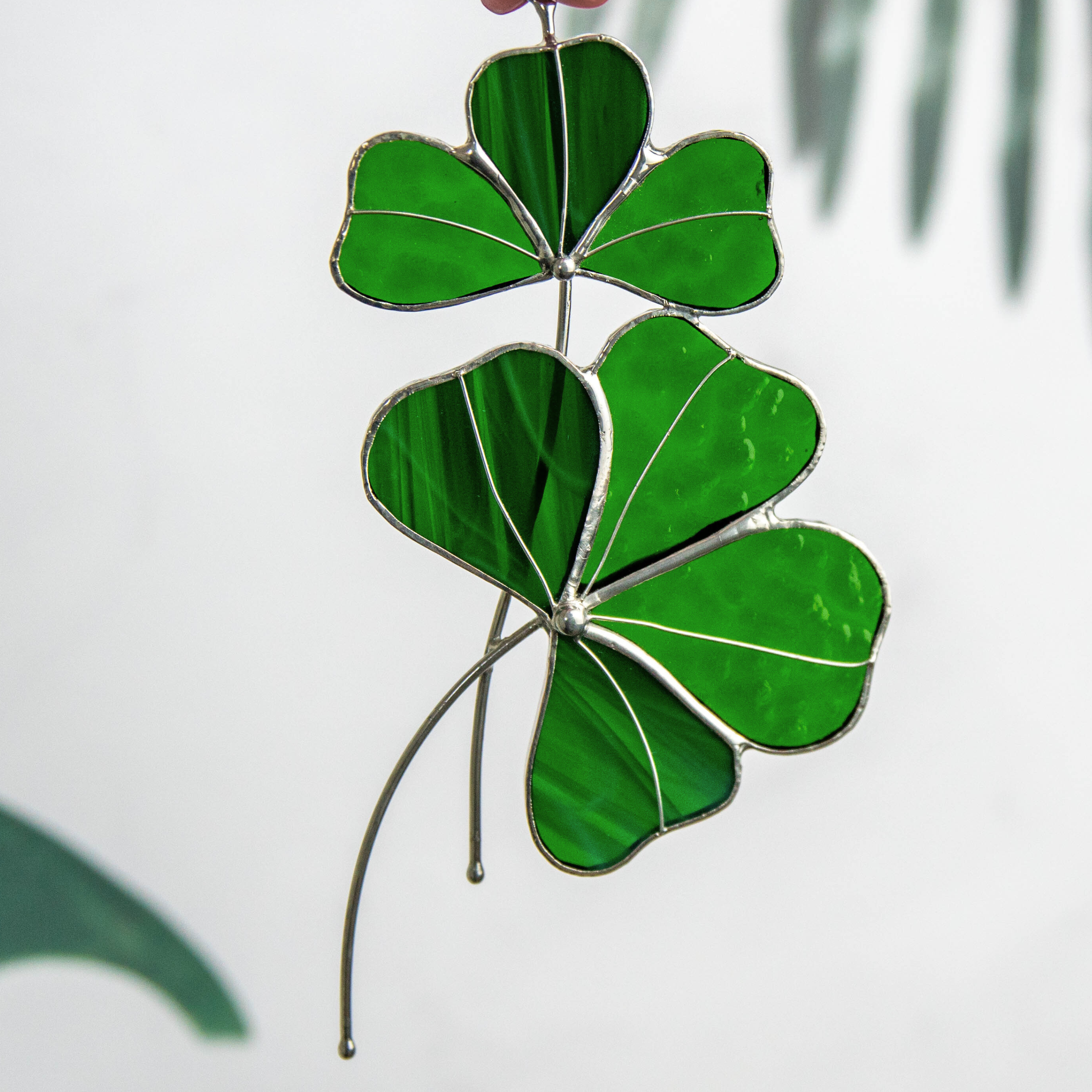 Zoomed view of clovers stained glass suncatcher