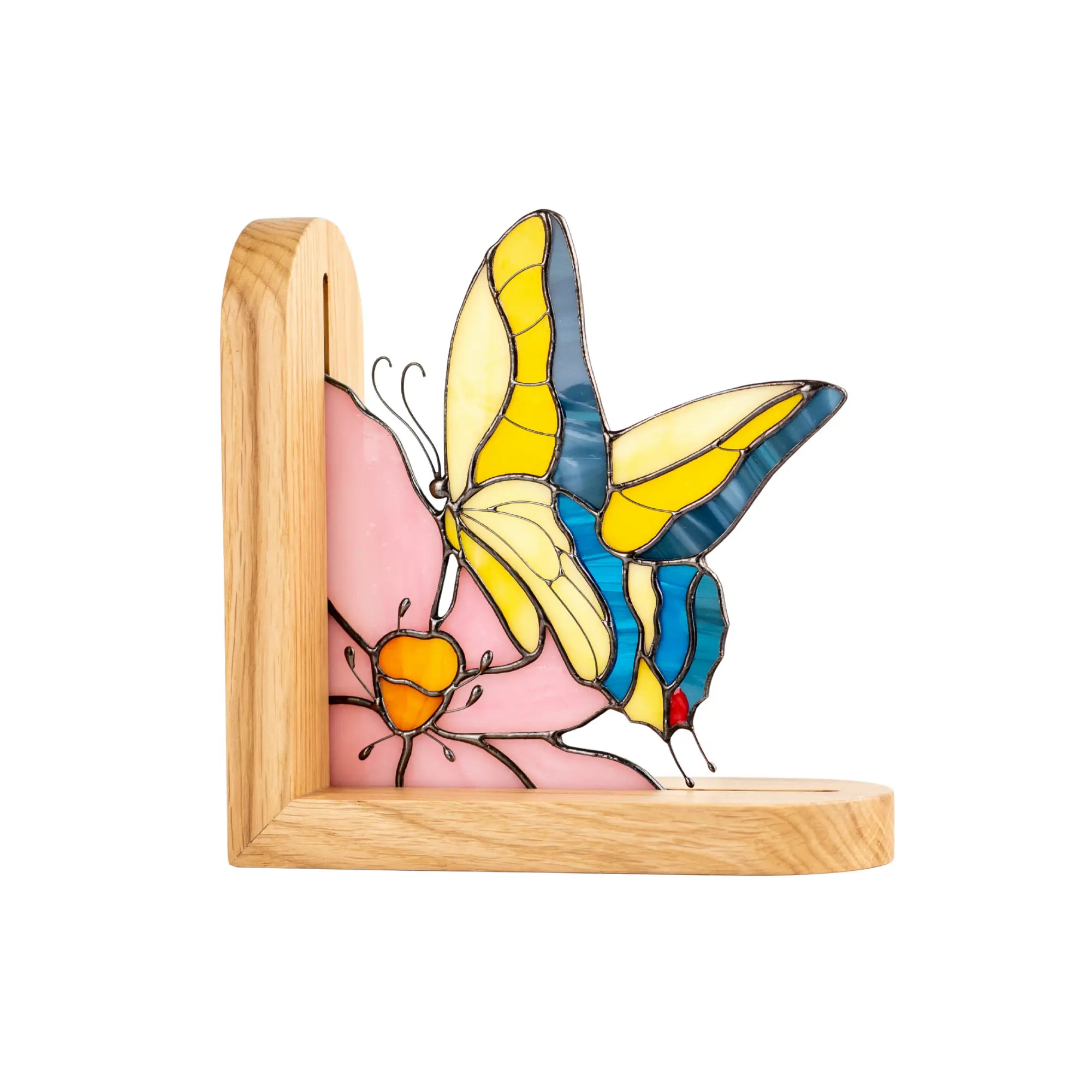 Colorful swallowtail butterfly stained glass bookend in a wooden frame on a white background