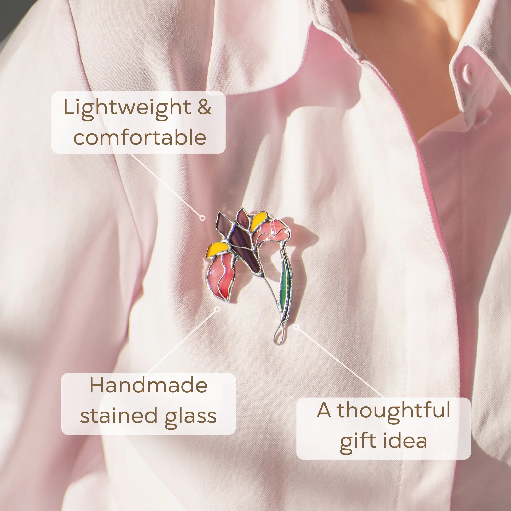 Colorful stained glass iris brooch on a white shirt as a thoughtful gift idea