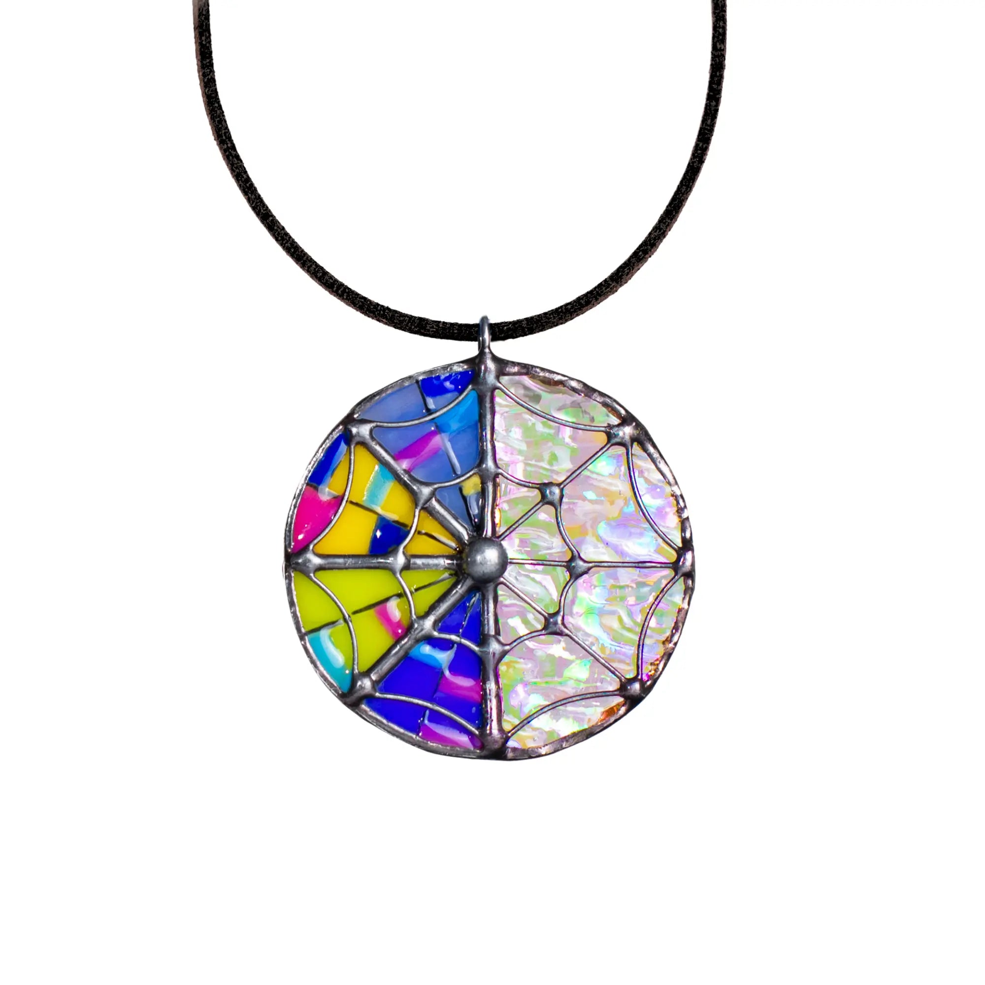 Colorful stained glass pendant with web on colorful irizated background on a black cord against a white background