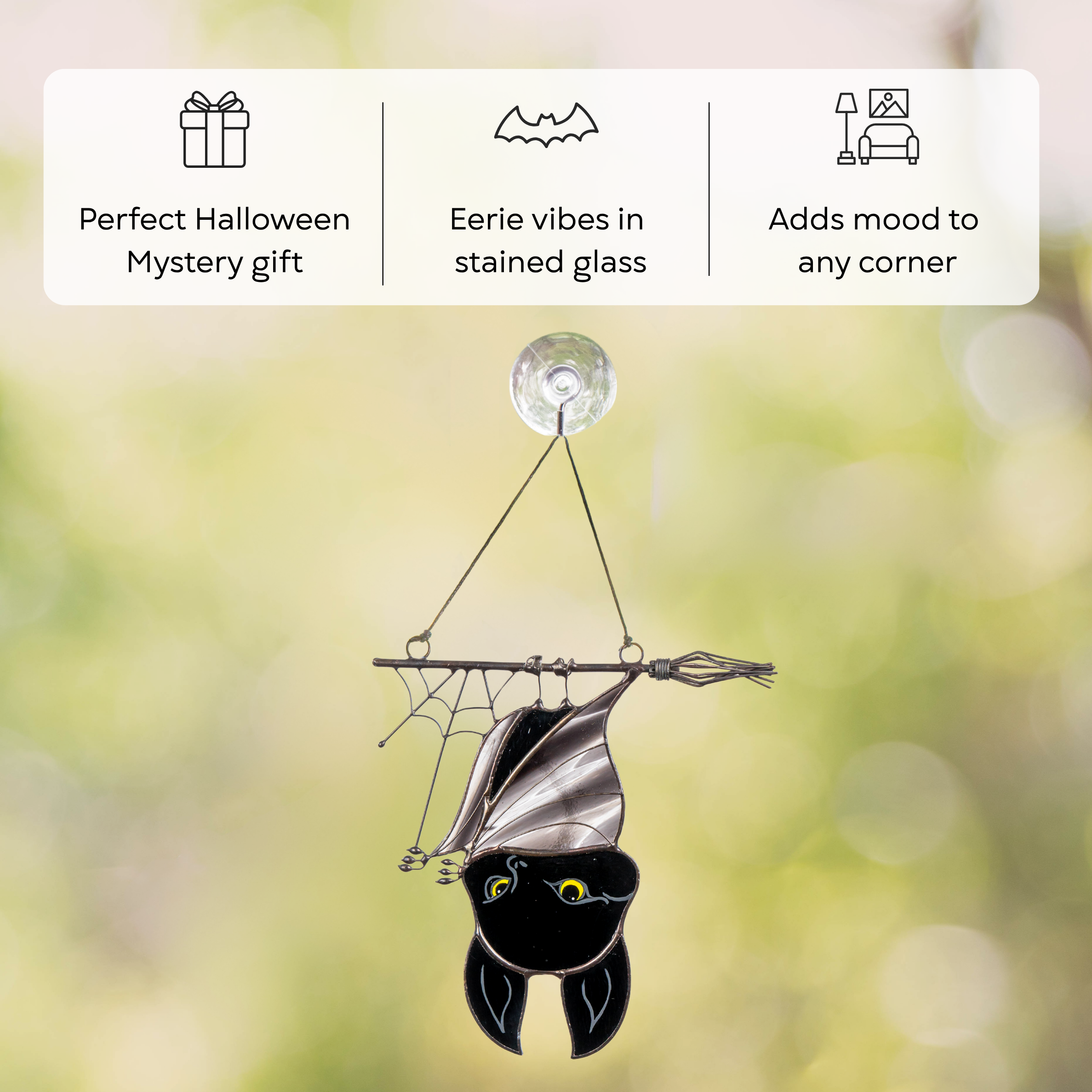 Bat suncatcher shown on suction cup as a perfect choice for Halloween Mystery gift.