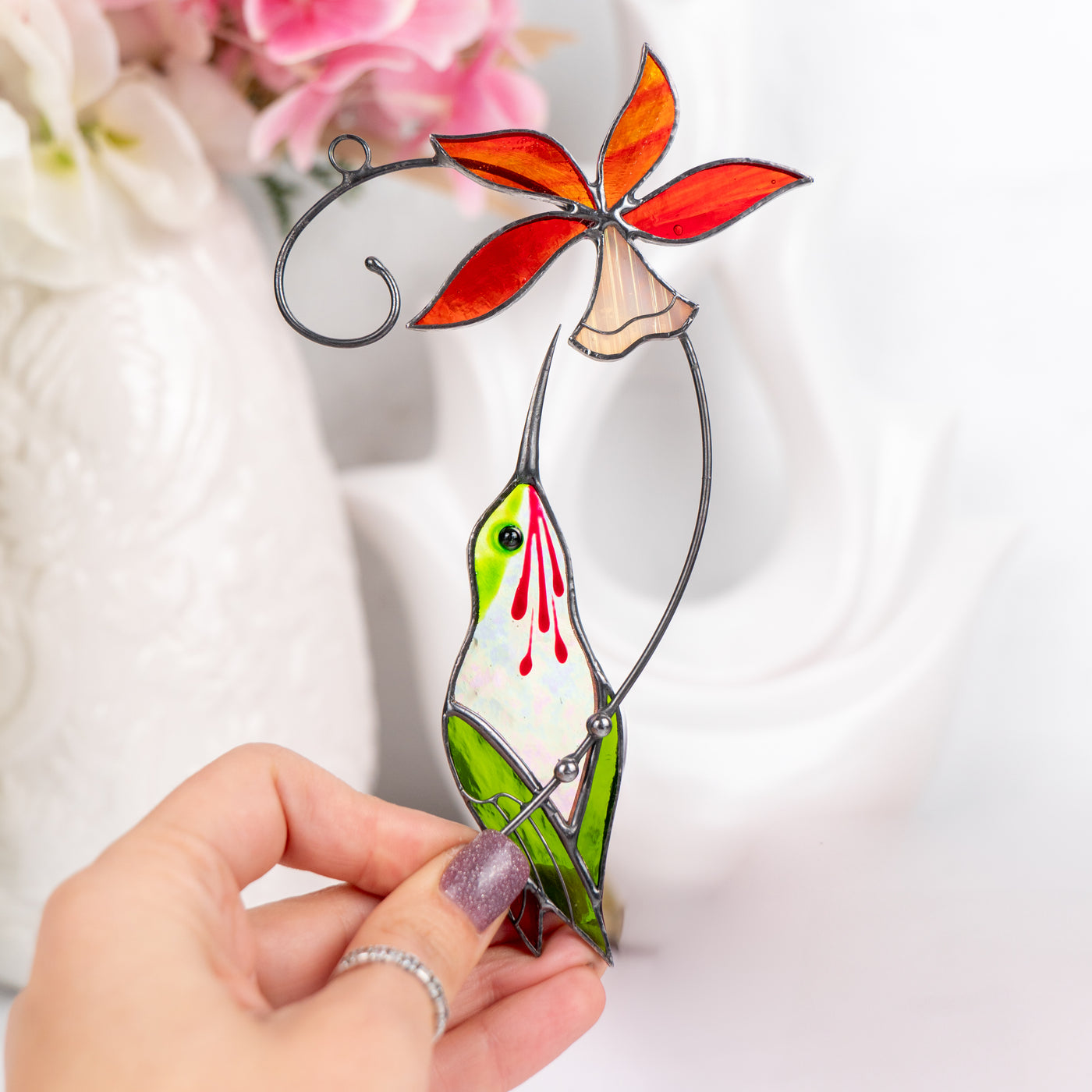 handmade glass hummingbird with the bell flower suncatcher