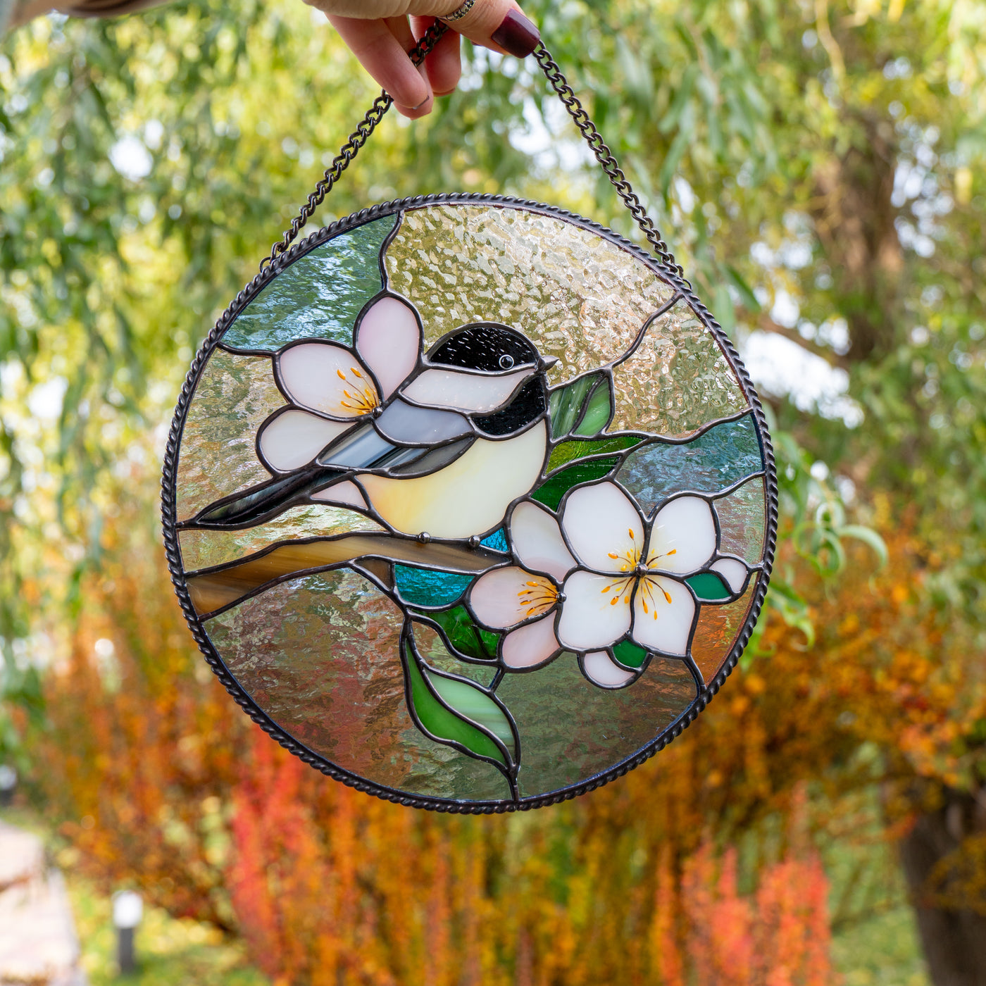 colorful chickadee suncatcher made of stained glass