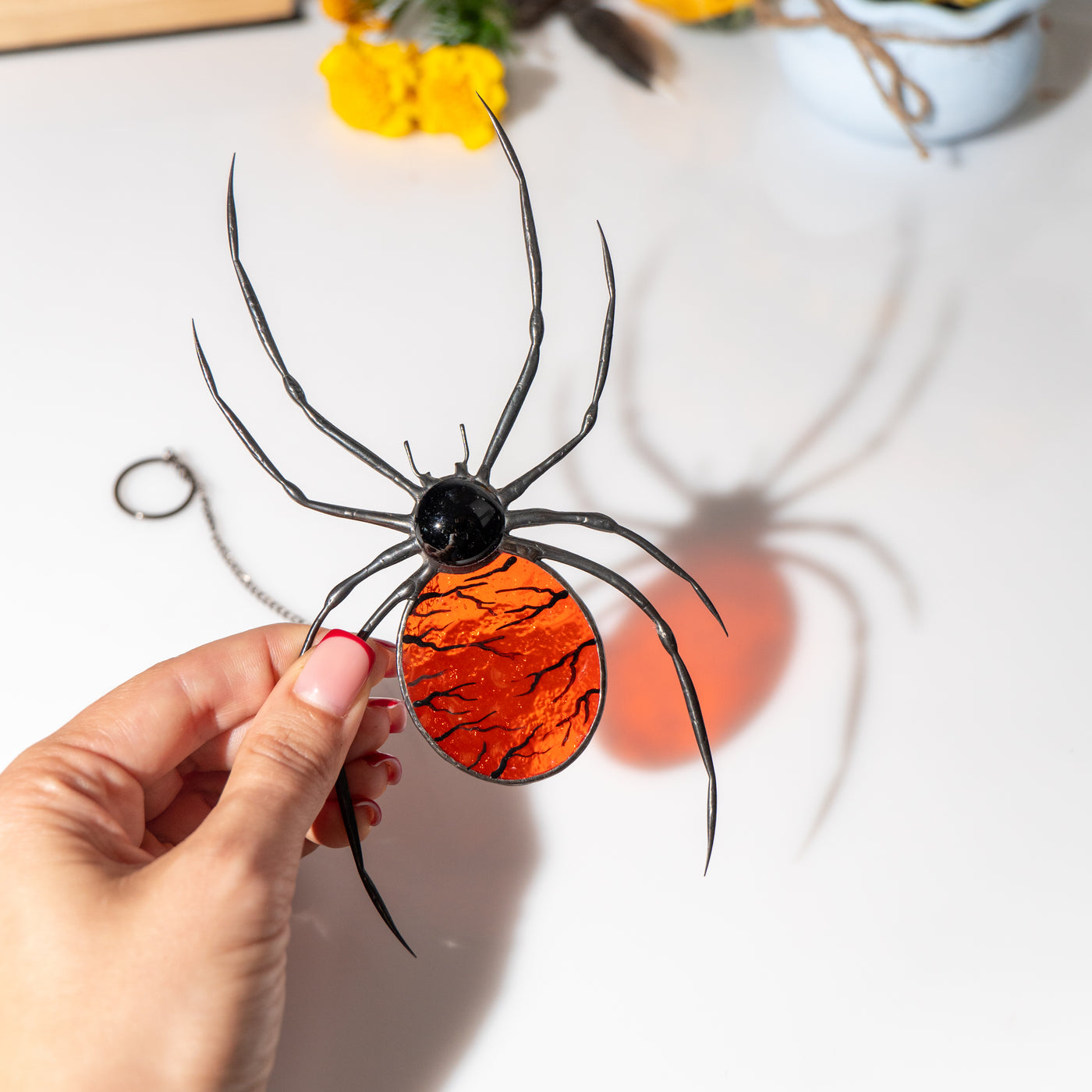 modern stained glass spider window hanging 