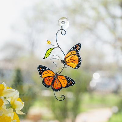 custom stained glass suncatcher of monarchs