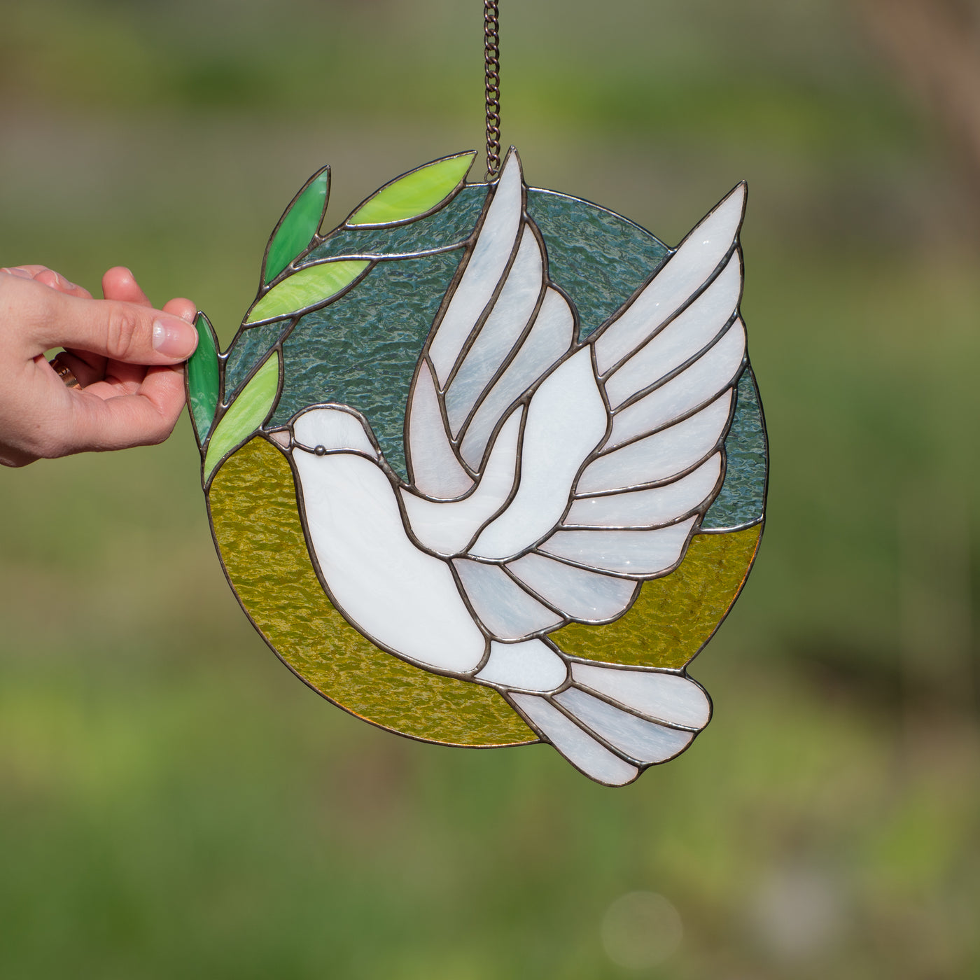 white dove window hanging made of modern stained glass