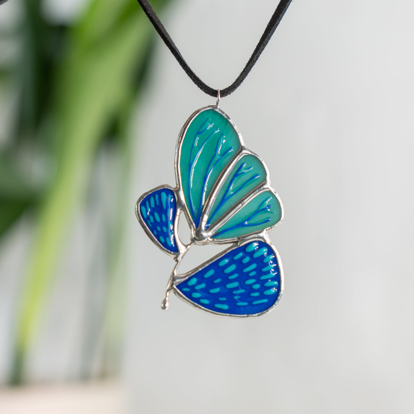 blue plant stained glass pendant