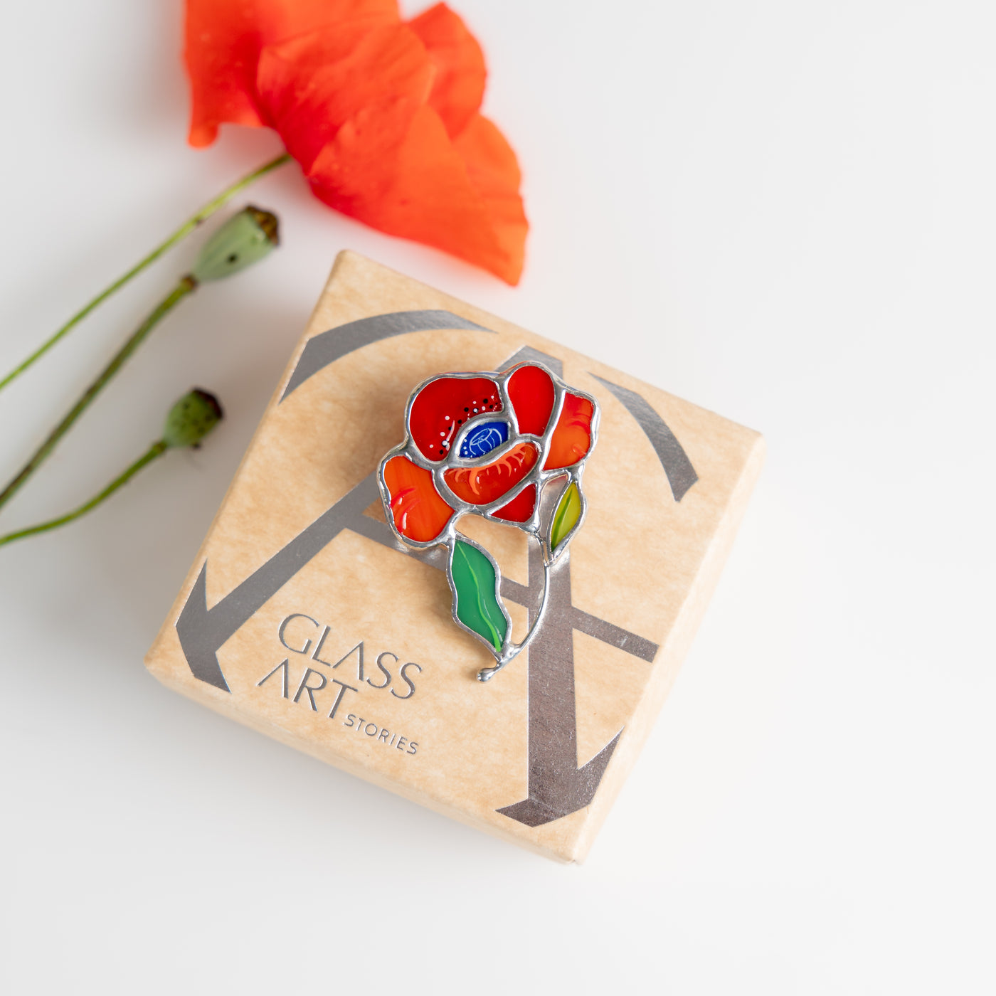 Stained glass poppy flower with green leaf pin