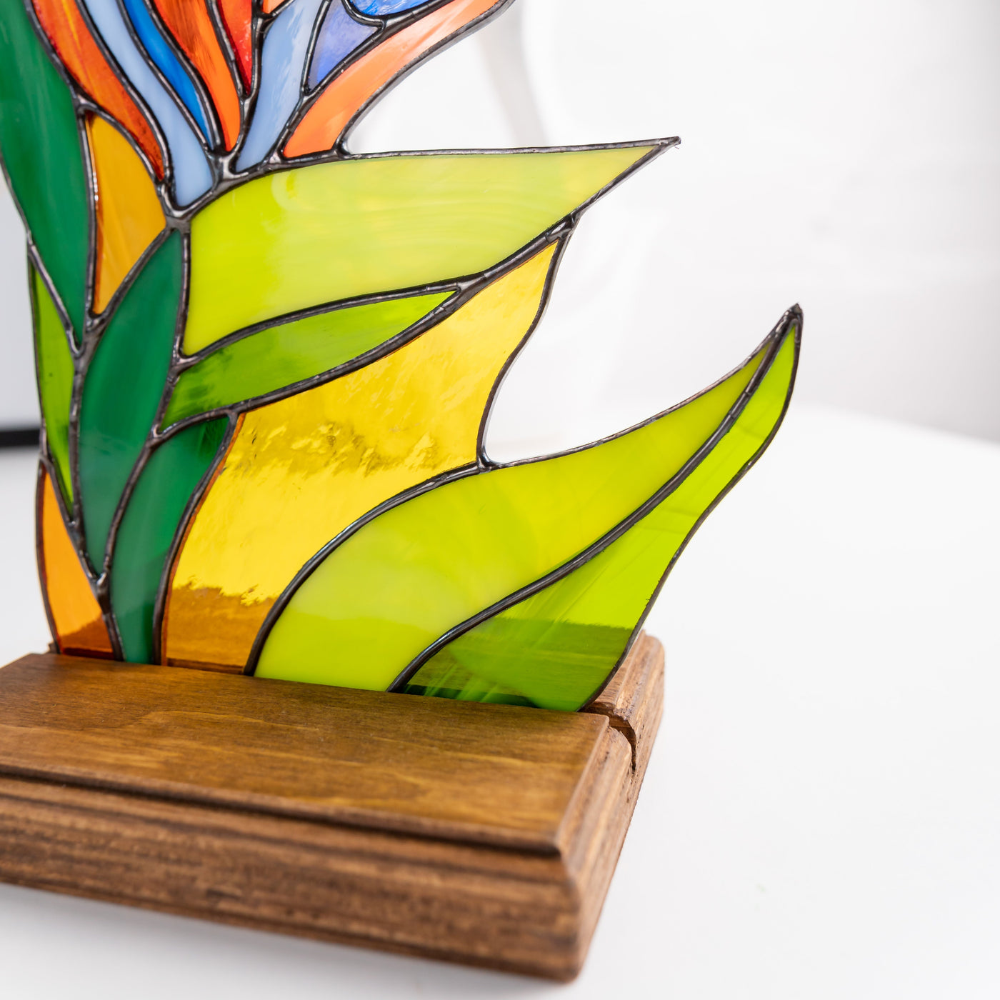 Zoomed stained glass strelitzia flower panel for table decor