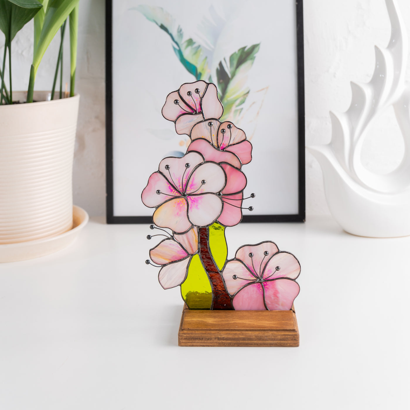 Stained glass sakura flower panel in a wooden base for table decor