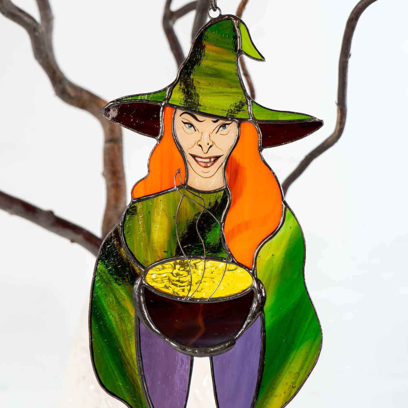 Zoomed stained glass witch with the pot suncatcher