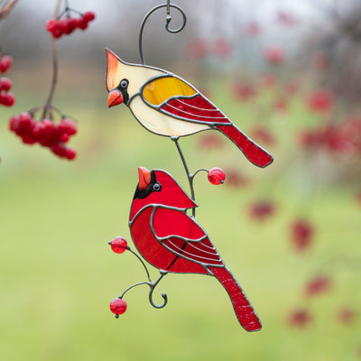 stained glass window decor of cardinals pair