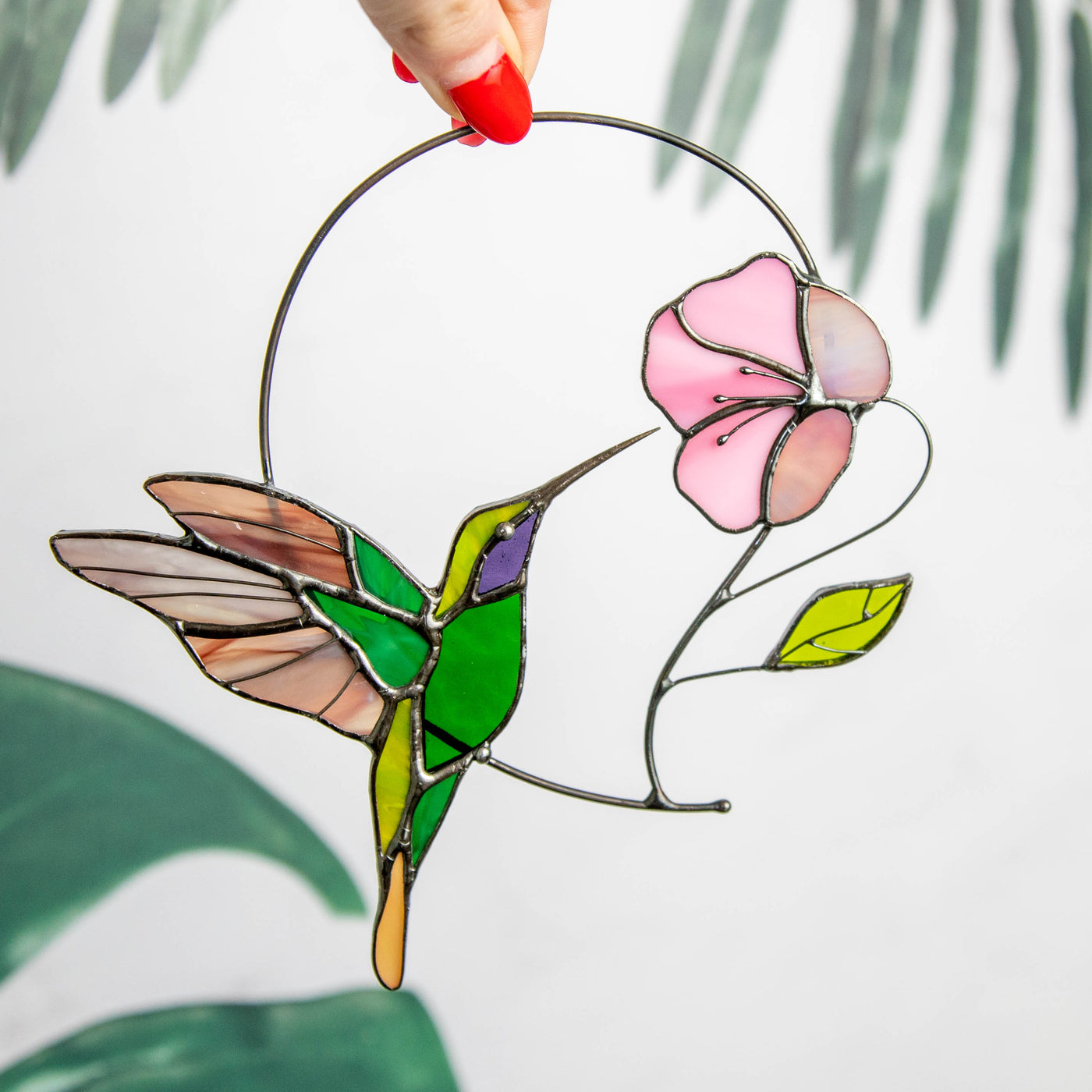 handmade glass hummingbird with the pink flower suncatcher