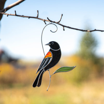 stained glass suncatcher of red winged blackbird