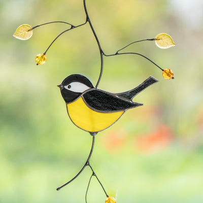 Zoomed black capped chickadee suncatcher of stained glass