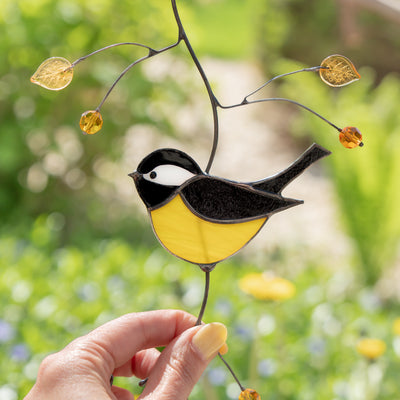 Zoomed stained glass chickadee window hanging 