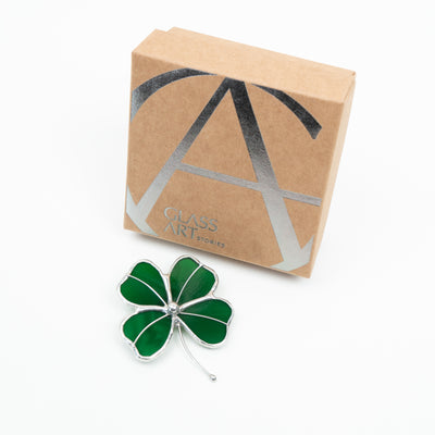 clover stained glass pin and the brand box of GlassArtStories