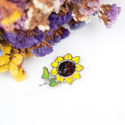 Ukrainian jewelry of sunflower brooch created of modern stained glass