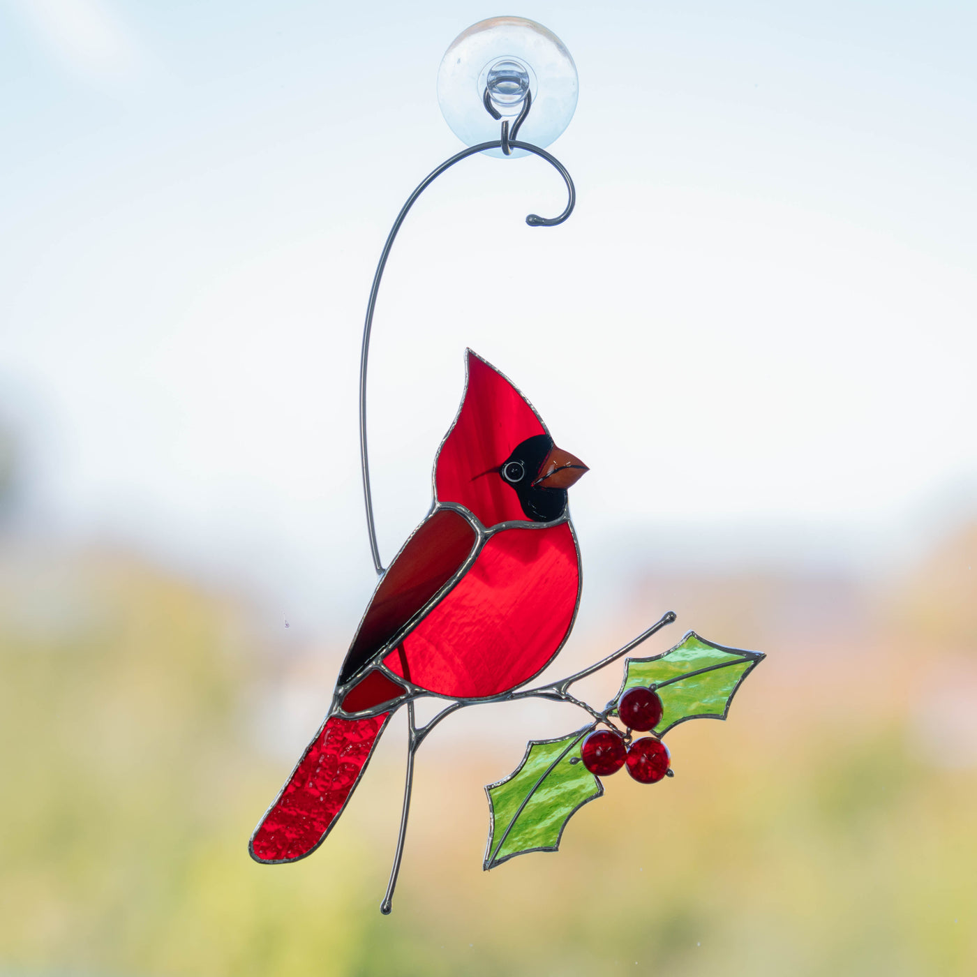 Christmas gifts of stained glass cardinal with holly leaves
