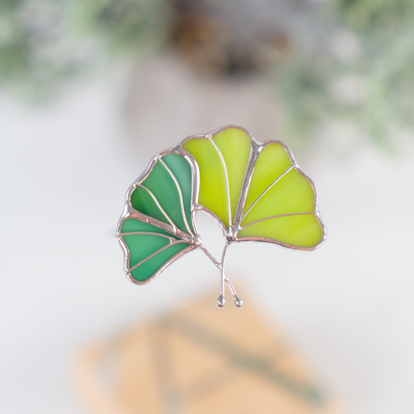 Stained glass pin of a ginkgo