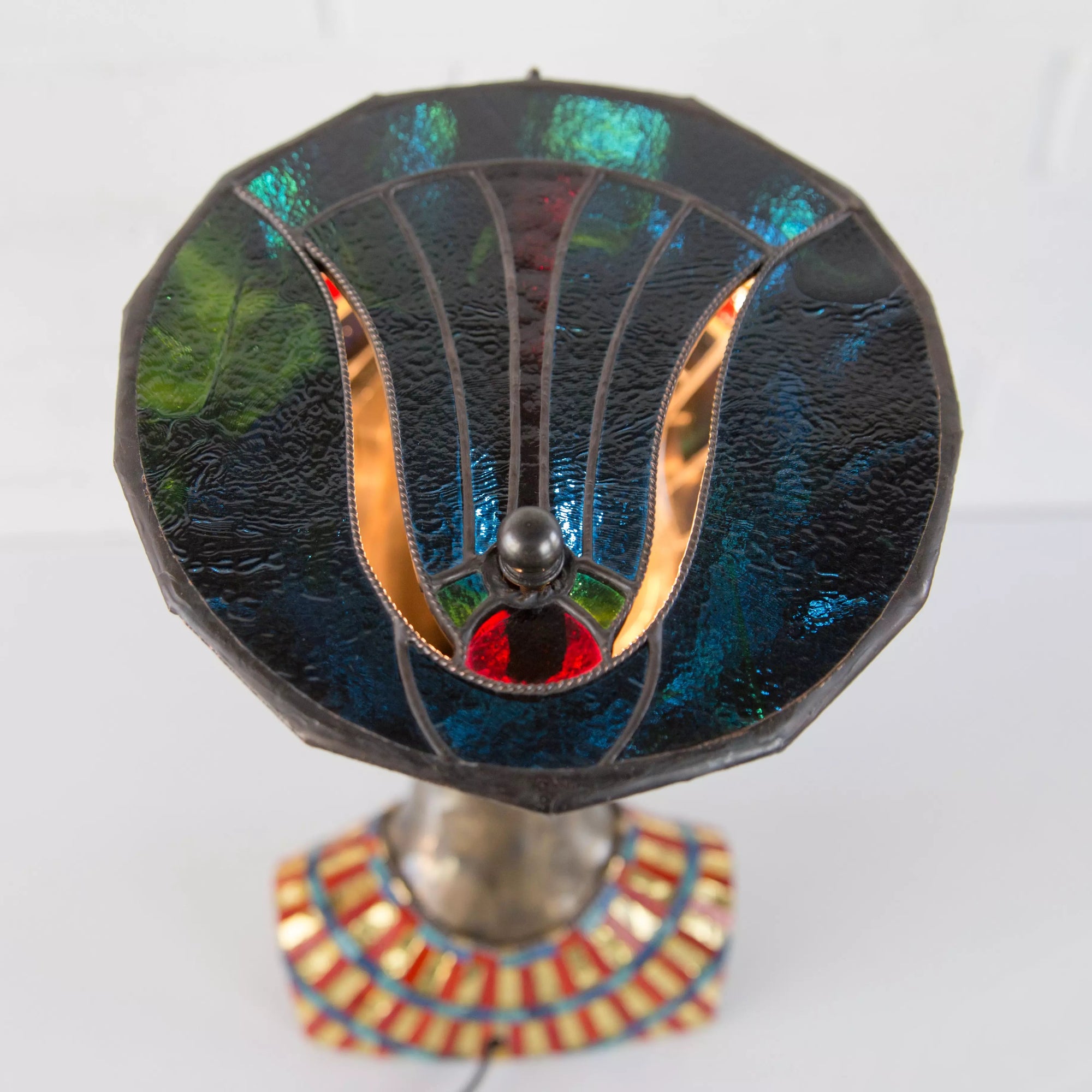 The top of stained glass Nefertiti Lamp with decorative element