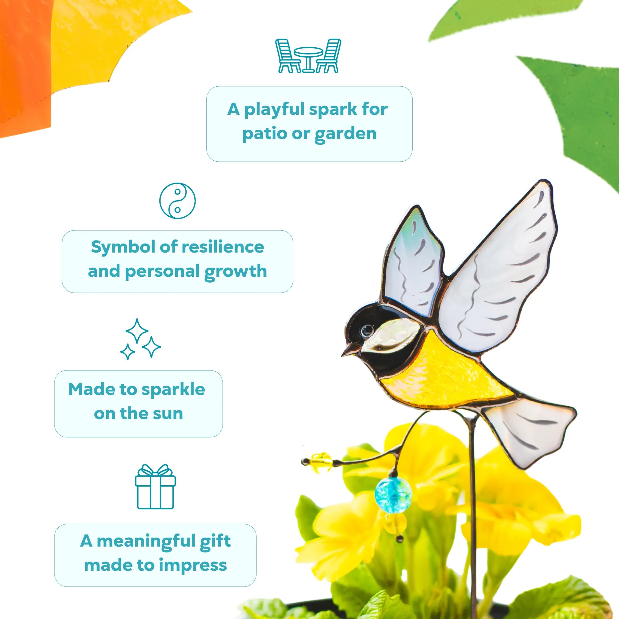 Stained glass garden stake with a chickadee design, flowers, as a symbol of resilience