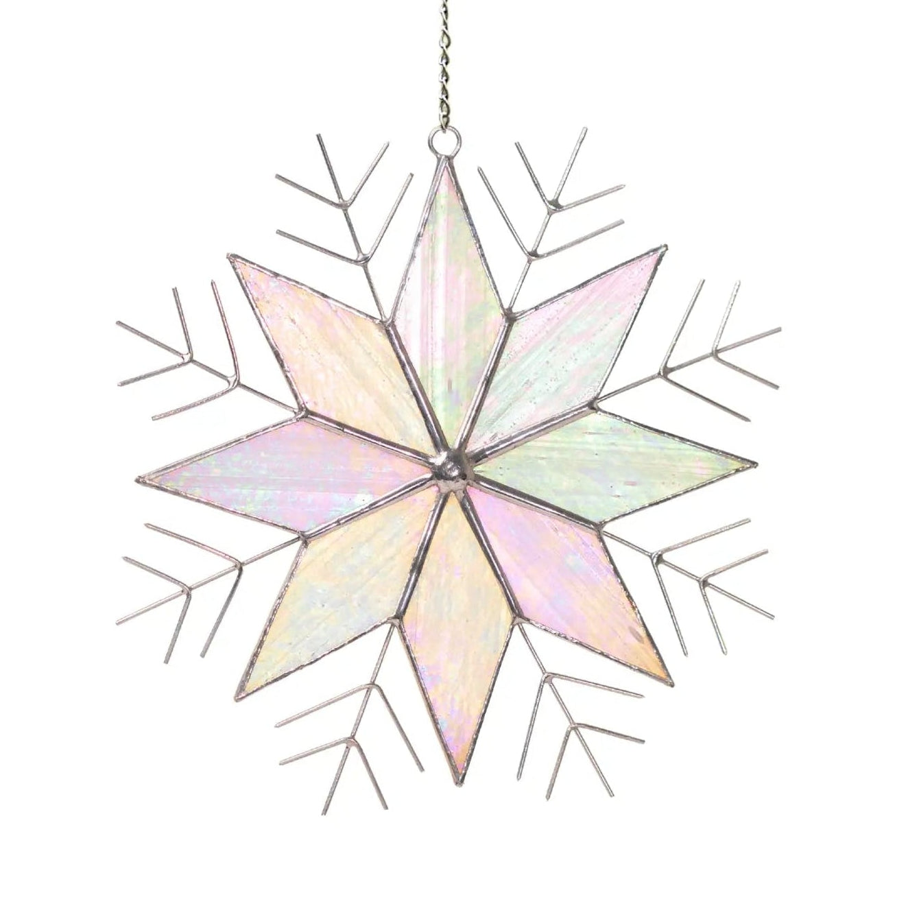 Stained glass snowflake ornament with pastel colors on a white background
