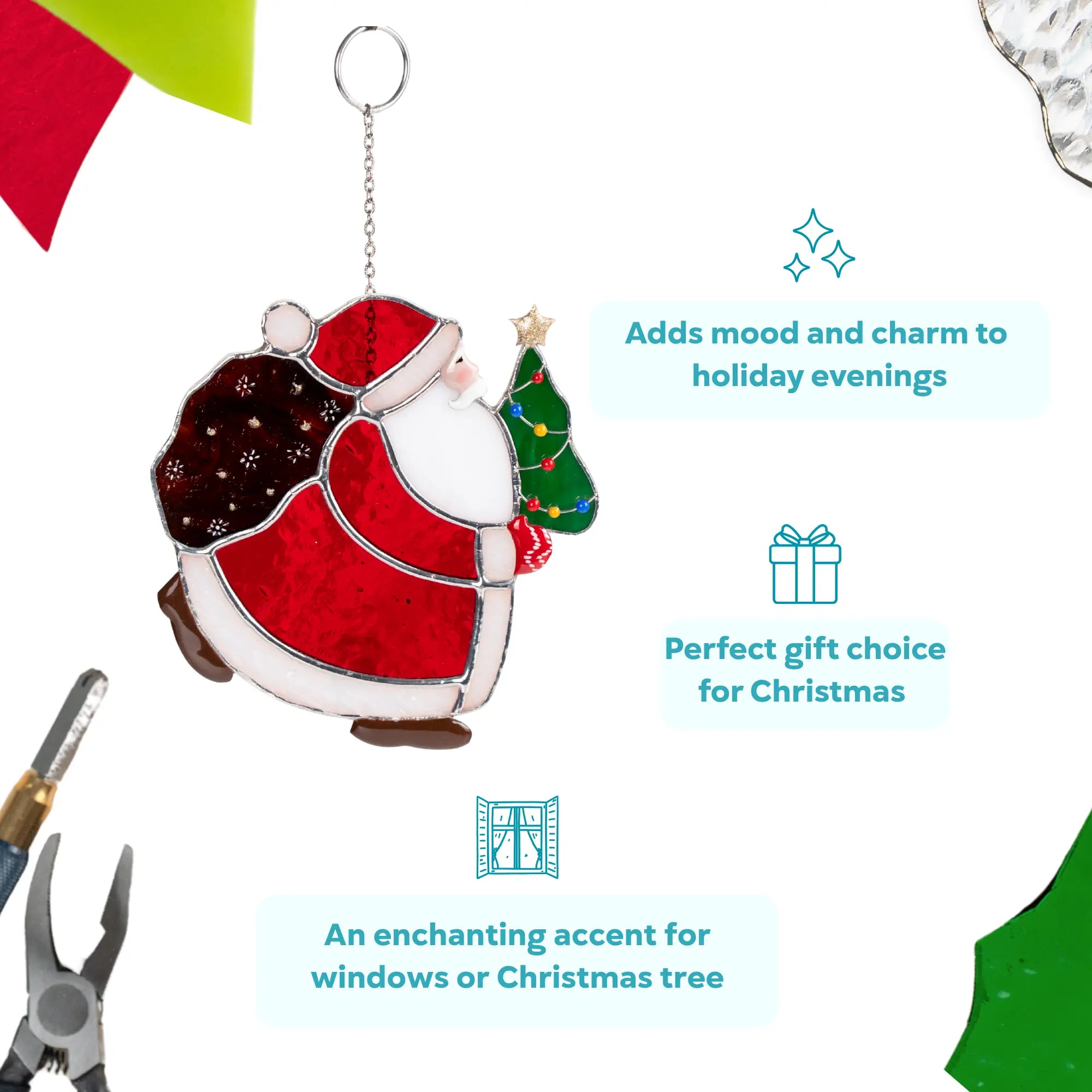 Stained glass suncatcher of a Santa carrying a bag and holding a Christmas tree, with text describing its use.