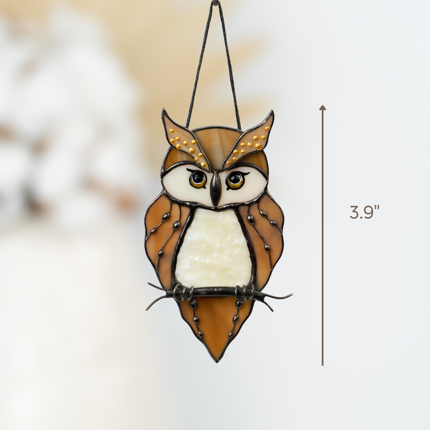 Stained glass owl with bright eyes and warm feathers, hanging from black cord, sized 3.9 inches