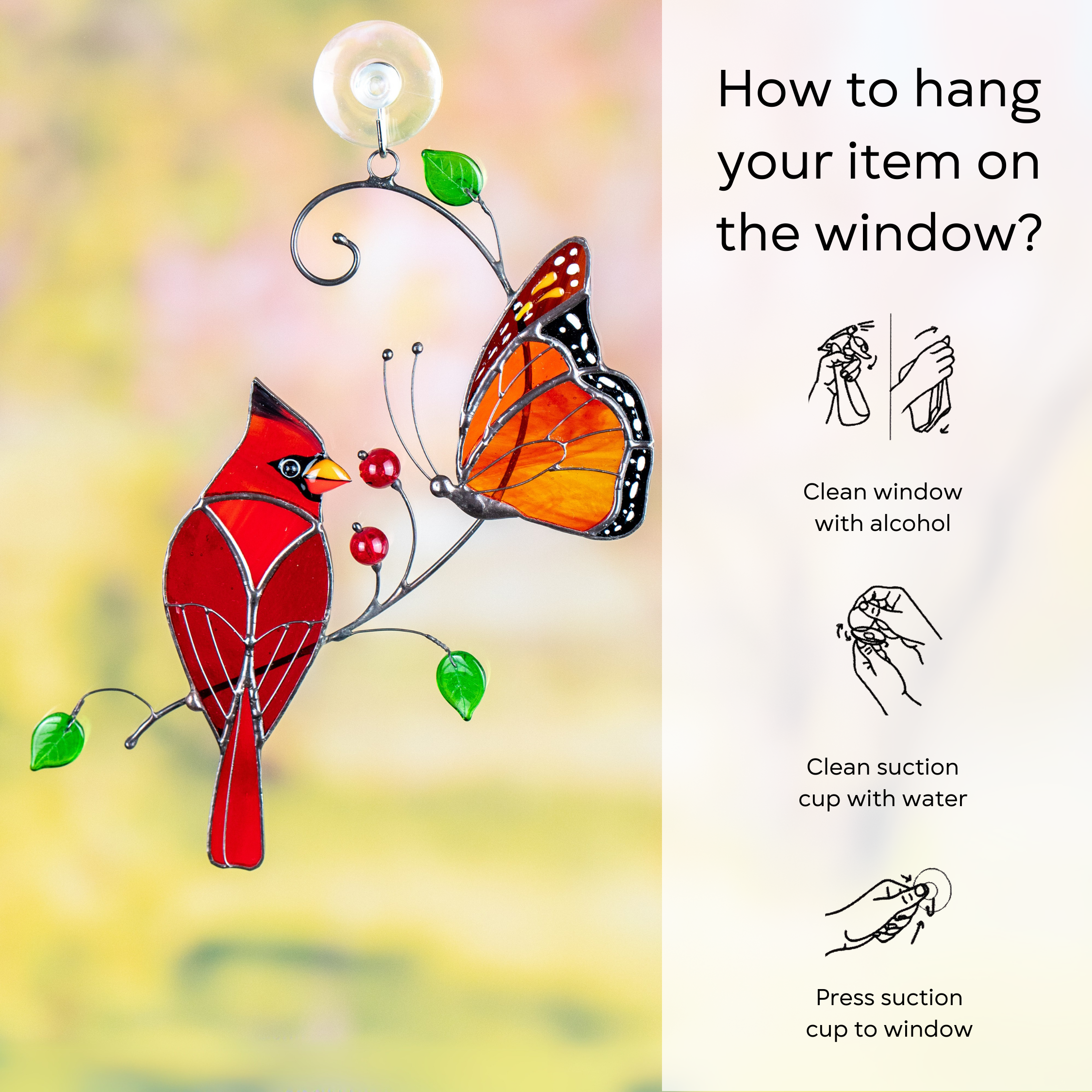 Stained glass cardinal and monarch butterfly suncatcher attaching to a window using a suction cup instruction: clean window and suction cup, press a cup to the surface.

