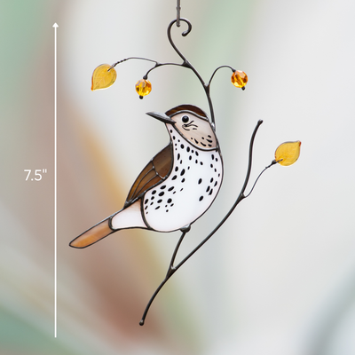 Full view of stained glass wood thrush with amber accents and curved branches, size 7.5 inches