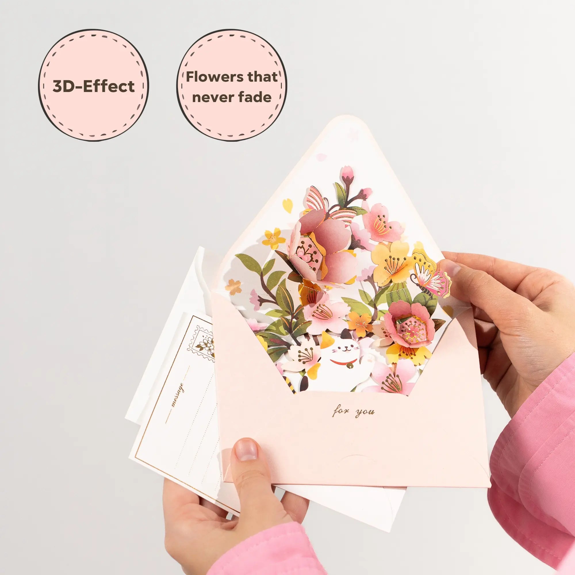 Floral card with 3D Flowers that never fade, held by a person.