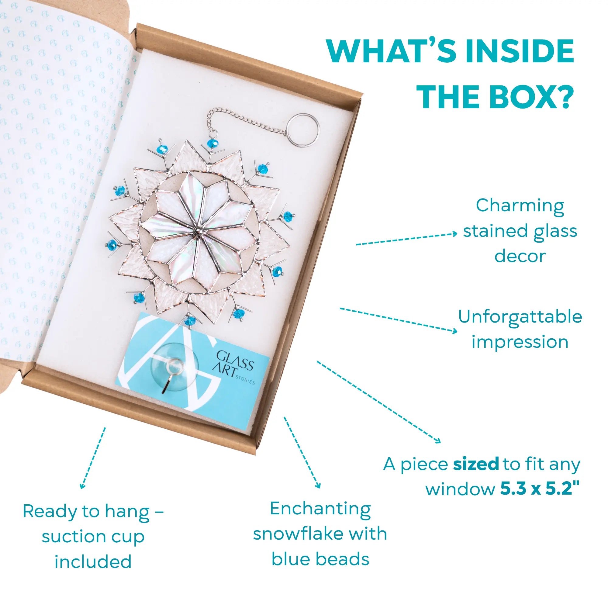 Glass art snowflake sized 5.3 x 5.2 inches in it's packaging with suction cup and branded card included